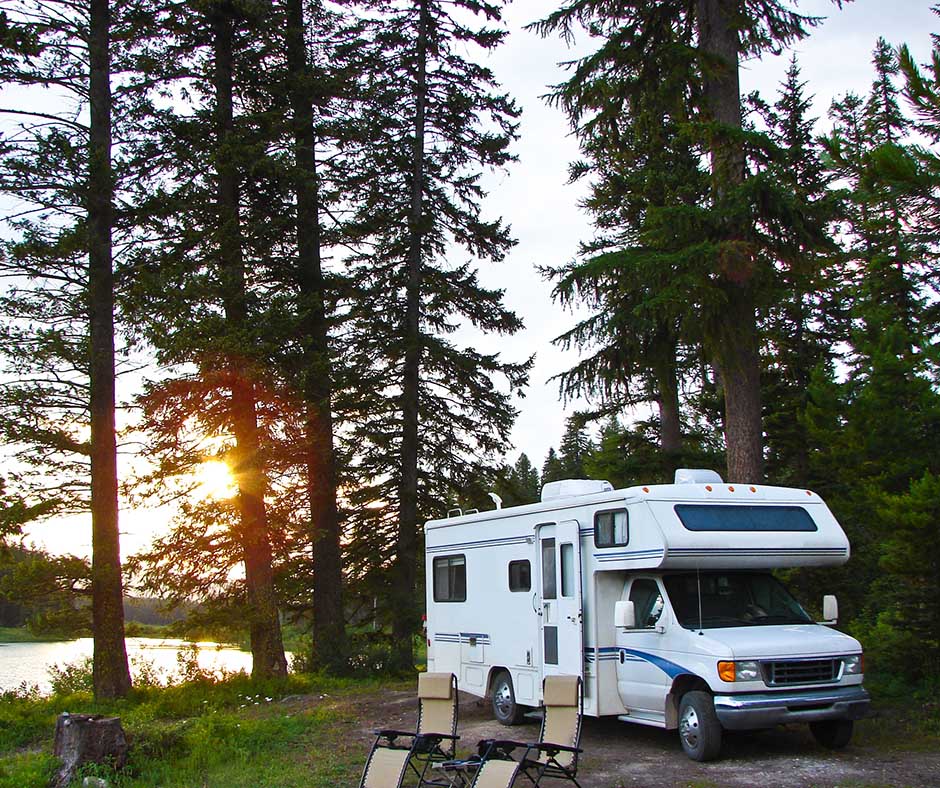 RV parked by a serene lakeside at sunset - https://www.evansagency.net/
